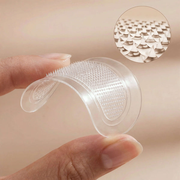 Closeup of Skintual under eye patches held by a hand with a close-up inset showing its texture.
