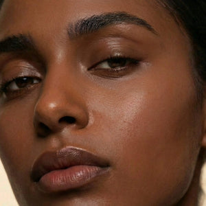 
Close-up of a woman's face with a neutral expression
