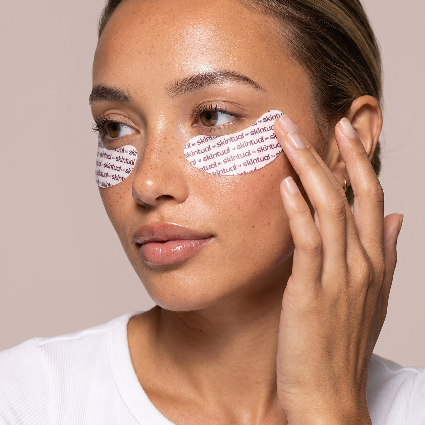 Applying Peptide Eye Reset patches